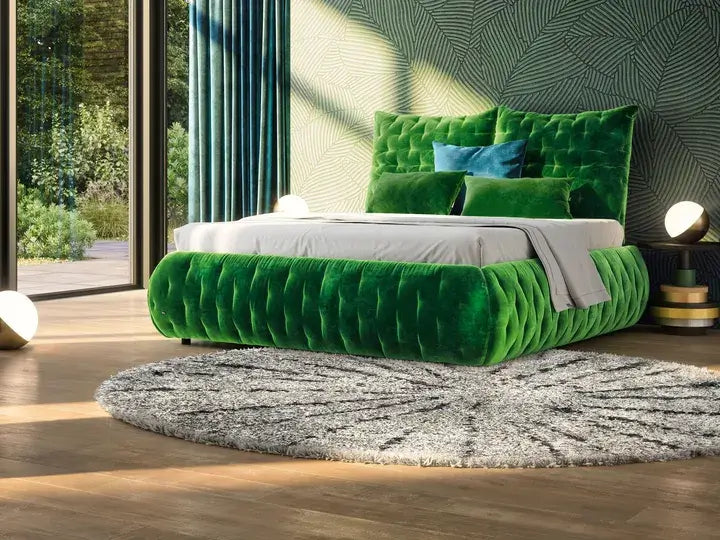 Luxury Feya Bed by BRETZ with green velour cover and adjustable back pillows in a modern bedroom setup.
